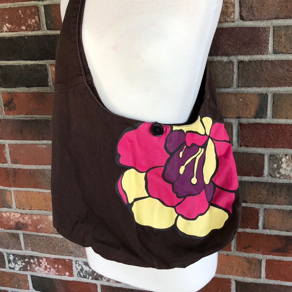 Brown bag with large colorful flower